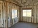 Interior of a new construction home showing framing and insulation in a room at 3730 N Maya Rd, Eloy, AZ 85131