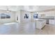 Modern kitchen with white cabinets, granite countertops, and stainless steel appliances at 3730 N Maya Rd, Eloy, AZ 85131