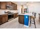 Modern kitchen with stainless steel appliances and an island at 40634 W Hillman Dr, Maricopa, AZ 85138