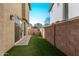 Small, private backyard with artificial turf and pavers at 4124 E Toledo St, Gilbert, AZ 85295