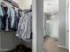 Large walk-in closet with ample hanging space and shelving at 4124 E Toledo St, Gilbert, AZ 85295