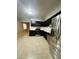 Kitchen with dark cabinets, granite counters and stainless steel appliances at 4325 N 26Th St # 12, Phoenix, AZ 85016