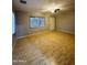 Living room with light wood flooring and ceiling fan at 4325 N 26Th St # 12, Phoenix, AZ 85016