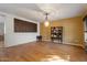 Formal dining room with wood flooring and built-in hutch at 4360 E Sierrita Rd, San Tan Valley, AZ 85143