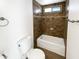 Clean bathroom with tub shower combo, tile surround and updated vanity at 4511 W Cavalier Dr, Glendale, AZ 85301