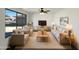 Bright living room featuring a comfy seating area and large window at 4511 W Cavalier Dr, Glendale, AZ 85301