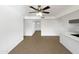 Spacious living room with tile flooring and ceiling fan at 4511 W Cavalier Dr, Glendale, AZ 85301