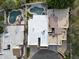 Aerial view showcasing a home with a pool and surrounding buildings at 4605 E Valley View Dr, Phoenix, AZ 85044