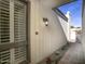 Inviting entryway with tile flooring, wood-framed windows, and a security door at 4605 E Valley View Dr, Phoenix, AZ 85044