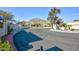 Landscaped front yard with a circular driveway and mountain views at 4605 E Valley View Dr, Phoenix, AZ 85044