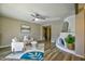 Living room with fireplace and hardwood floors, offering a cozy atmosphere at 4605 E Valley View Dr, Phoenix, AZ 85044