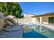 Relaxing pool area with patio furniture at 4605 E Valley View Dr, Phoenix, AZ 85044