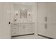 Modern bathroom with white cabinets and hexagon tile at 5101 N Casa Blanca Dr # 301, Paradise Valley, AZ 85253