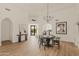 Bright dining room features a round table and chandelier at 5101 N Casa Blanca Dr # 301, Paradise Valley, AZ 85253