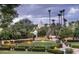 Evening view of the community garden with pathway and fountain at 5101 N Casa Blanca Dr # 301, Paradise Valley, AZ 85253