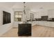 Modern kitchen with dark countertops and island at 5101 N Casa Blanca Dr # 301, Paradise Valley, AZ 85253