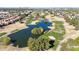 Aerial view of a community with a golf course and lake at 5122 E Shea Blvd # 1100, Scottsdale, AZ 85254