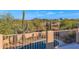 Scenic backyard oasis with a pool, cacti, and mountain views at 5743 E Windstone Trl, Cave Creek, AZ 85331