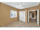 Bedroom with tiled floors and double door closet at 5743 E Windstone Trl, Cave Creek, AZ 85331