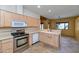 Kitchen with stainless steel appliances and light wood cabinets at 5743 E Windstone Trl, Cave Creek, AZ 85331