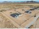 Aerial view of house and surrounding desert landscape at 57968 W Fulcar Rd, Maricopa, AZ 85139