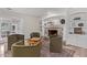 Relaxing living area with fireplace and built-in shelving at 5801 E Exeter Blvd, Phoenix, AZ 85018