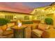 Inviting patio features fire pit and comfortable seating for relaxing evenings at 5801 E Exeter Blvd, Phoenix, AZ 85018