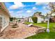 Brick patio area with cornhole and a view of the pool at 5801 E Exeter Blvd, Phoenix, AZ 85018