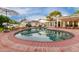 Inviting kidney-shaped pool with brick coping and lounge chairs at 5801 E Exeter Blvd, Phoenix, AZ 85018