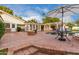 Spacious pool patio with seating area, umbrella, and refreshing pool at 5801 E Exeter Blvd, Phoenix, AZ 85018