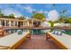 Relaxing poolside view with lounge chairs and a refreshing pool at 5801 E Exeter Blvd, Phoenix, AZ 85018