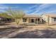 Backyard view of home with desert landscaping at 6307 S Palo Blanco Dr, Gold Canyon, AZ 85118