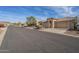 Street view of a neighborhood home with desert landscaping at 6307 S Palo Blanco Dr, Gold Canyon, AZ 85118