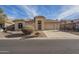 One-story home with two-car garage and desert landscaping at 6307 S Palo Blanco Dr, Gold Canyon, AZ 85118