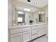 Double vanity bathroom with modern sink and plenty of cabinet space at 6318 N 19Th St, Phoenix, AZ 85016