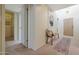 Inviting entryway with coat bench, decorative rug, and adjacent closet at 6318 N 19Th St, Phoenix, AZ 85016