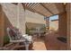 Relaxing patio with brick flooring, pergola, and seating at 6318 N 19Th St, Phoenix, AZ 85016