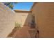 Brick paved side yard with storage and plants at 6318 N 19Th St, Phoenix, AZ 85016