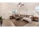 Spacious living room with L-shaped sectional sofa at 653 N Abalone Dr, Gilbert, AZ 85233