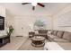 Living room with sectional sofa and view of entry at 653 N Abalone Dr, Gilbert, AZ 85233