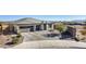 Single-story home with two-car garage and landscaped yard at 6551 N 127Th Dr, Glendale, AZ 85307