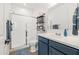 Clean bathroom with walk-in shower and modern vanity at 6551 N 127Th Dr, Glendale, AZ 85307