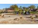 Community playground with shaded seating and play equipment at 6551 N 127Th Dr, Glendale, AZ 85307