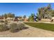 Community playground with play structures and shaded seating area at 6551 N 127Th Dr, Glendale, AZ 85307