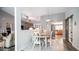 Farmhouse style dining room with a view of the kitchen at 7710 W Aster Dr, Peoria, AZ 85381