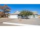 Charming single-story home with attached garage and well-maintained yard at 7710 W Aster Dr, Peoria, AZ 85381