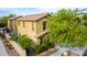 Two-story house with tan exterior and tile roof at 7844 W Bonitos Dr, Phoenix, AZ 85035