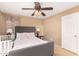 Cozy bedroom featuring a queen-size bed and ample closet space at 7844 W Bonitos Dr, Phoenix, AZ 85035