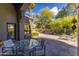 Outdoor patio with seating area, lush landscaping, and a relaxing atmosphere at 7878 E Gainey Ranch Rd # 3, Scottsdale, AZ 85258