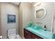 Modern bathroom with glass sink and pebble tile at 7878 E Gainey Ranch Rd # 3, Scottsdale, AZ 85258